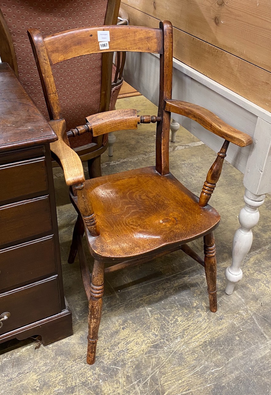 A Victorian ash, elm and beech Windsor elbow chair
